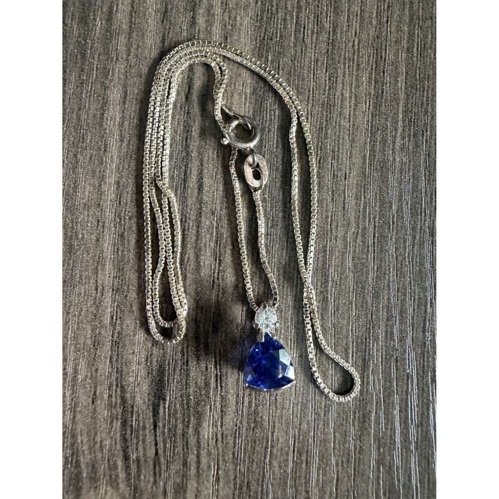 Sterling silver necklace and pendant .